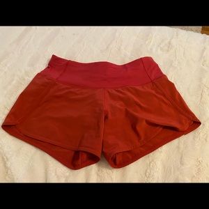 Burnt red lululemon shorts, long length